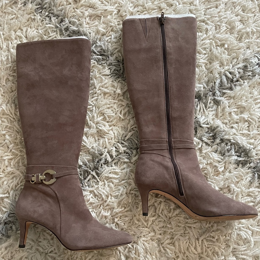 Antonio Melani knee high boots with buckle and small heel size 7.5. Worn once.